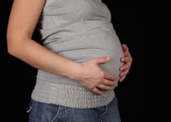 Боли внизу живота при беременности, причины, что делать